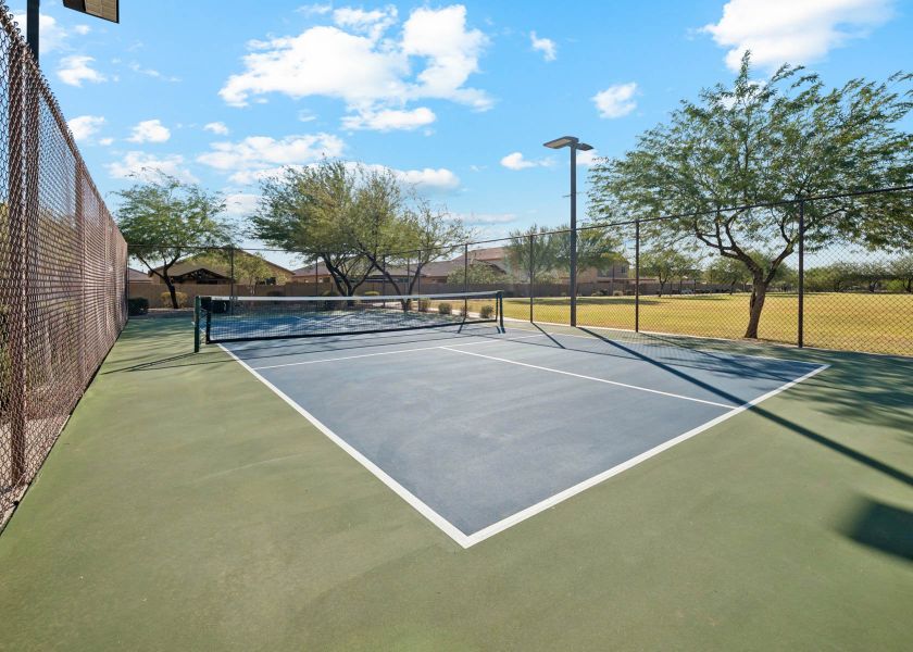 A tennis court with a net.