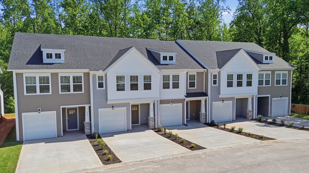 Eye-catching exterior with timeless color palette and superior architectural detail on these townhomes at El Dorado