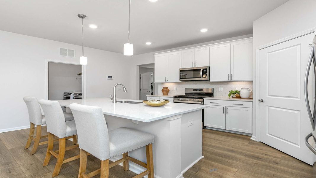 Furnished interior in a model home at The Villas at Kinsley in Jamestown (Image 17).