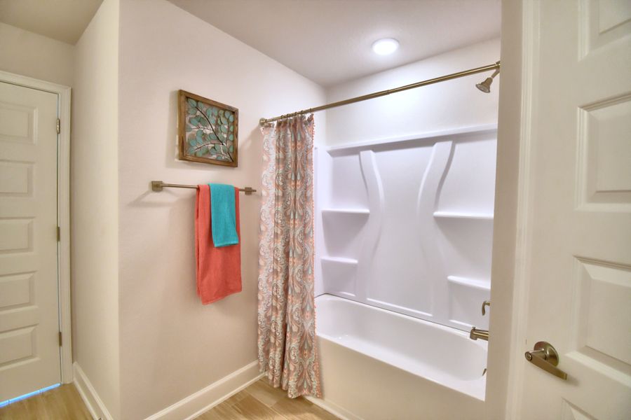 Furnished interior in a model home at Citrus Landing in Davenport (Image 40).