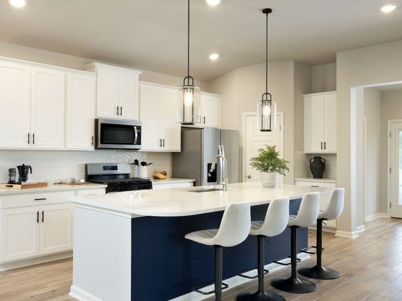 Kitchen in the Rio Grande floorplan at a Meritage Homes community.