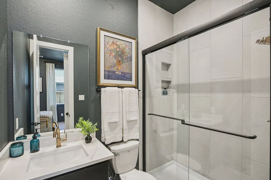 Furnished interior in a model home at Meridiana 50's in Manvel (Image 5).