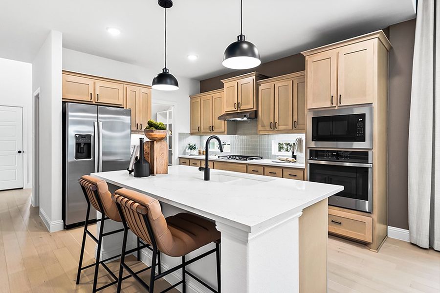 Furnished interior in a model home at The Reserve at Spiritas Ranch in Little Elm (Image 7).