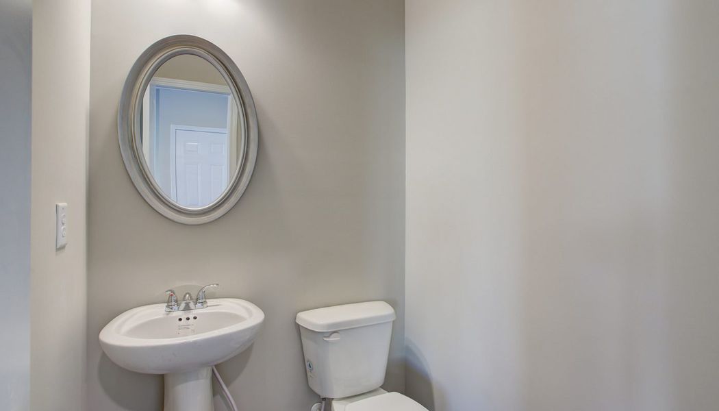 Furnished interior in a model home at North Village in Rydal (Image 9).