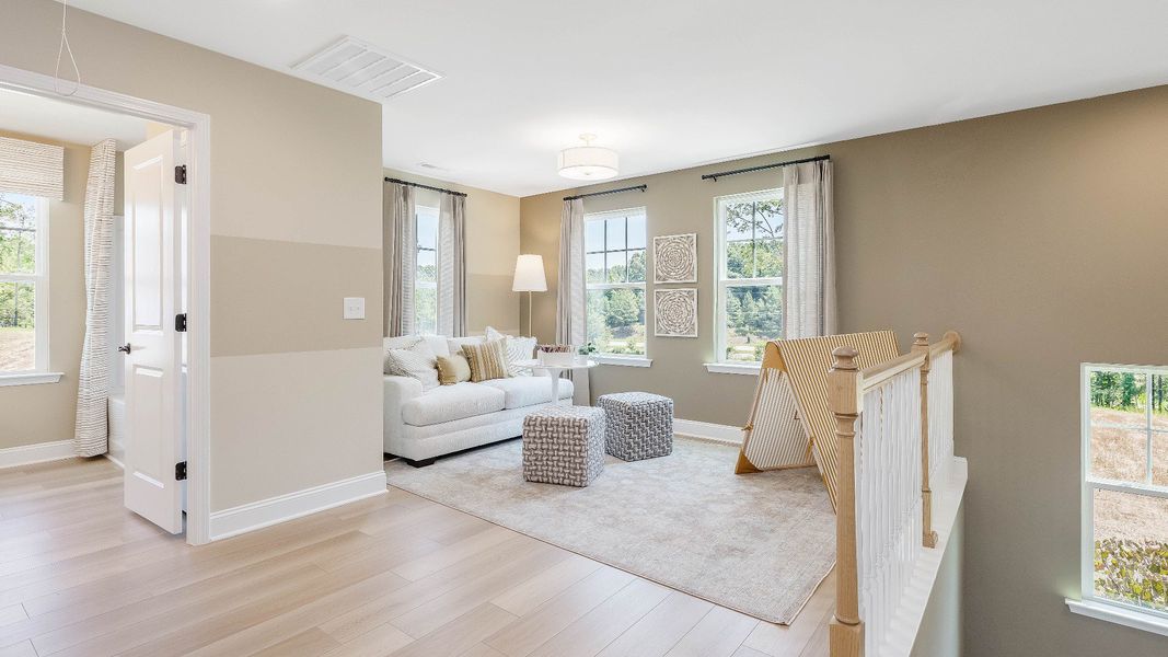 Furnished interior in a model home at The Farm at Neill's Creek in Lillington (Image 21). Furnished interior in a model home at The Farm at Neill's Creek in Lillington (Image 21).