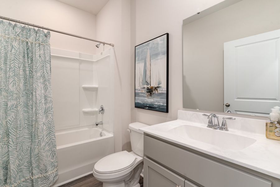 Furnished interior in a model home at Kingston Bay in Conway (Image 14).