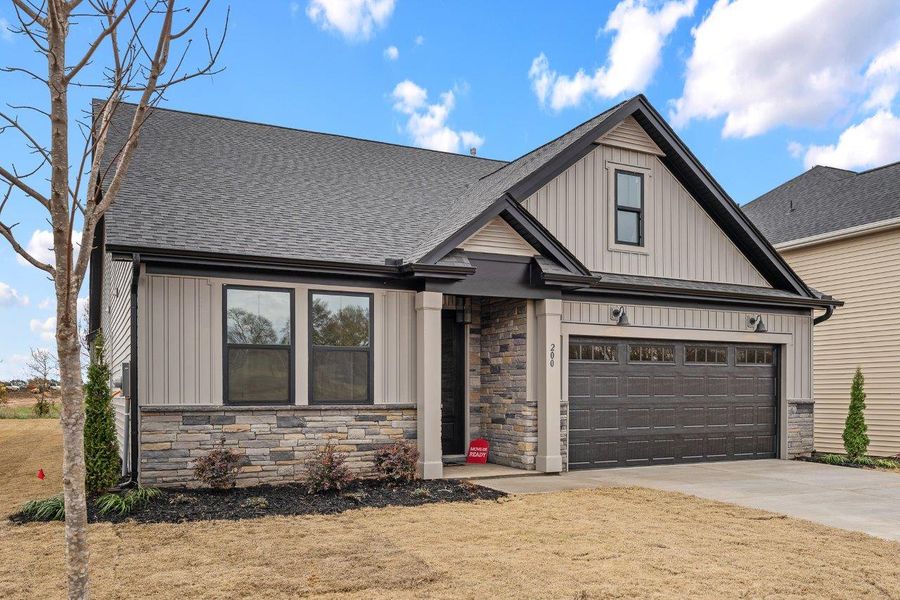 Front exterior of a home in the Eagle Creek community, located in Central, SC (Image 13).