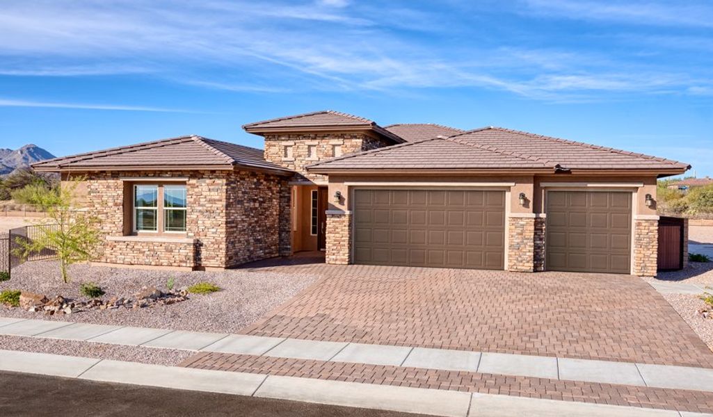 Front exterior of a home in the Saguaro Reserve III community, located in Marana, AZ (Image 2).