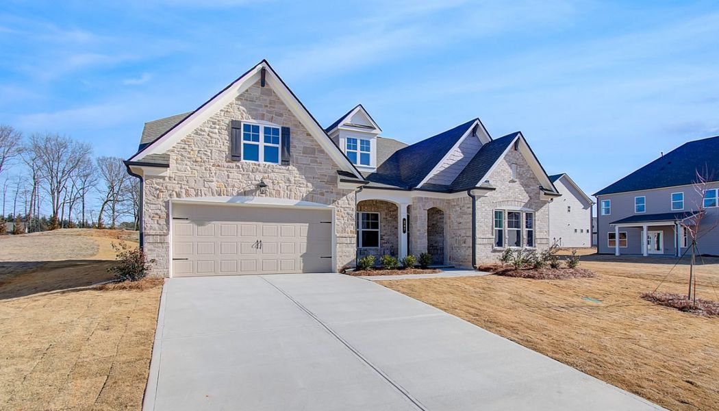 Front exterior of a home in the Ponderosa Farms Reserve community, located in Gainesville, GA (Image 10).