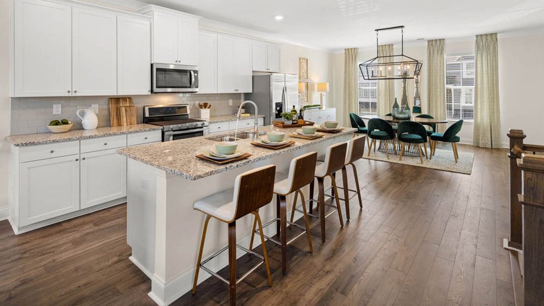 Furnished interior in a model home at Garden Lakes in Hampton (Image 18).
