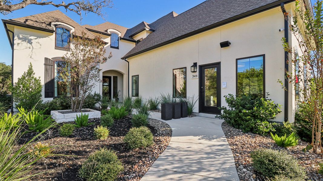 This Verandas at the Rim home features exquisite dormer windows and elegant landscaping, offering unmatched luxury. This Verandas at the Rim home features exquisite dormer windows and elegant landscaping, offering unmatched luxury.