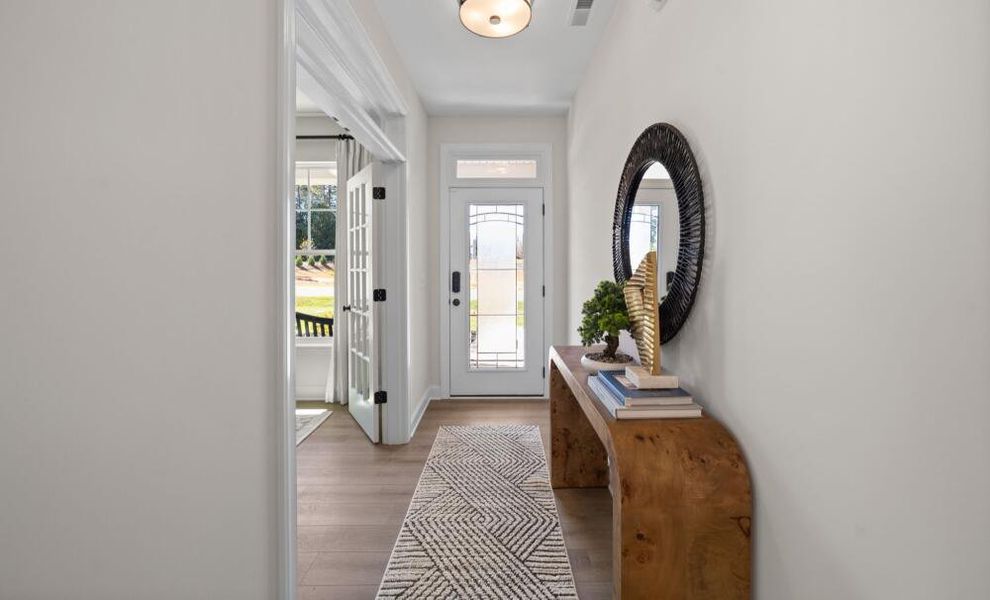 Furnished interior in a model home at Pisgah Park in Kernersville (Image 5).