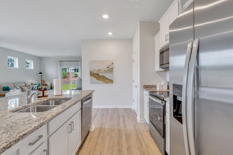 Furnished interior in a model home at Westbrook Retreat Villas at Savannah Quarters in Pooler (Image 16).