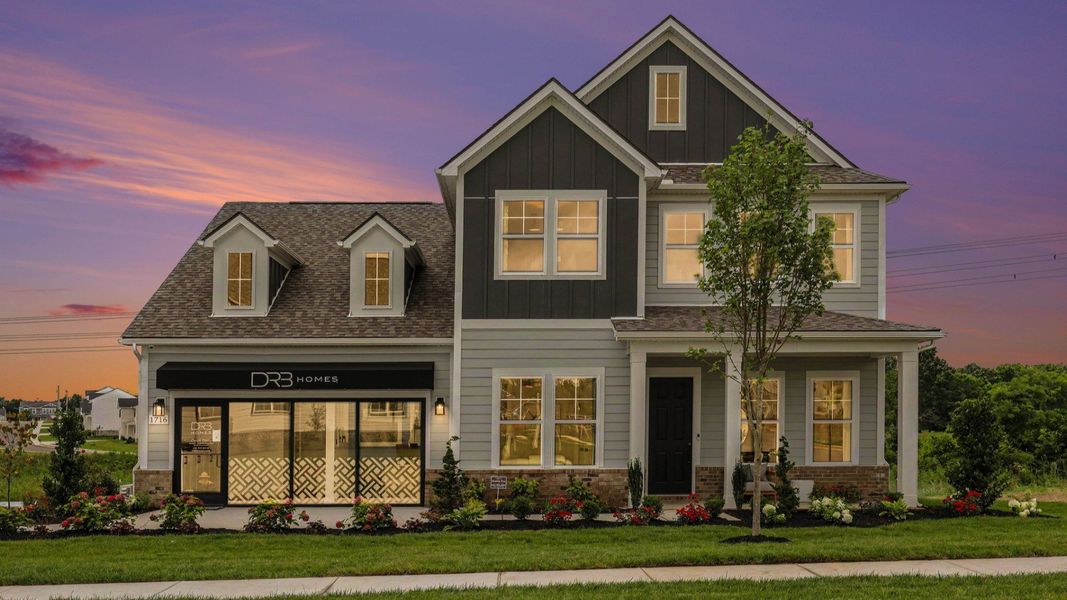 Front exterior of model home at dusk Front exterior of model home at dusk