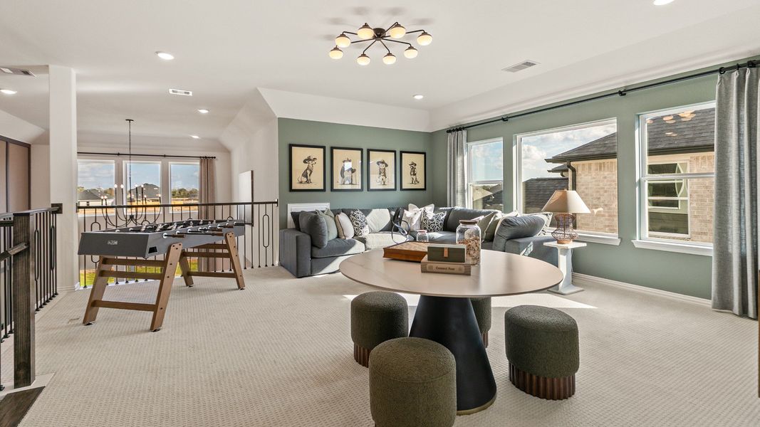 Furnished interior in a model home at Creekhaven in Iowa Colony (Image 26).