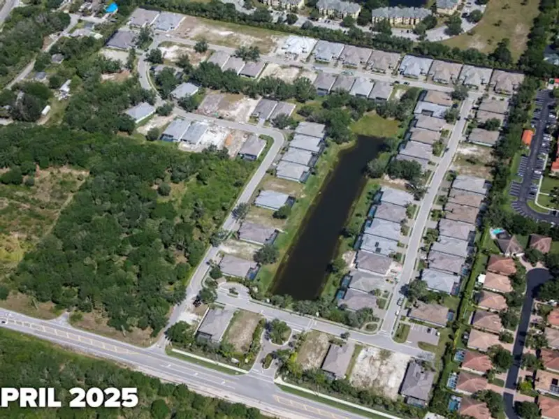 Aerial view of the Lucaya Pointe community in Vero Beach, FL, showing layout and nearby surroundings (Image 9).