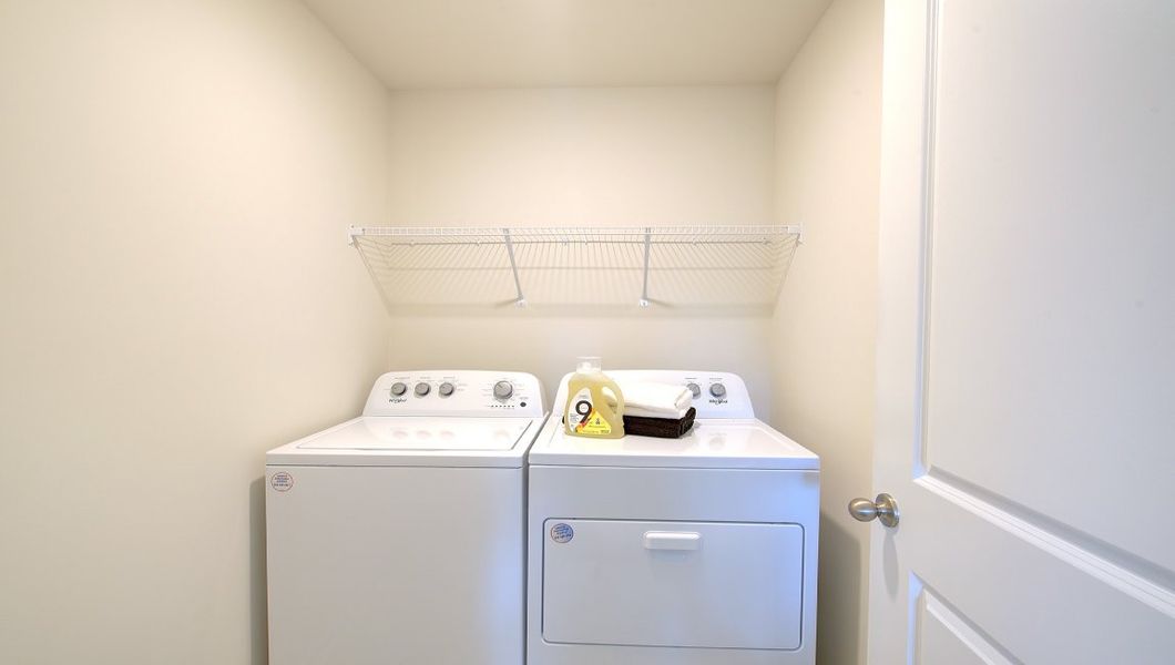 Furnished interior in a model home at Heritage Park in Fletcher (Image 40).