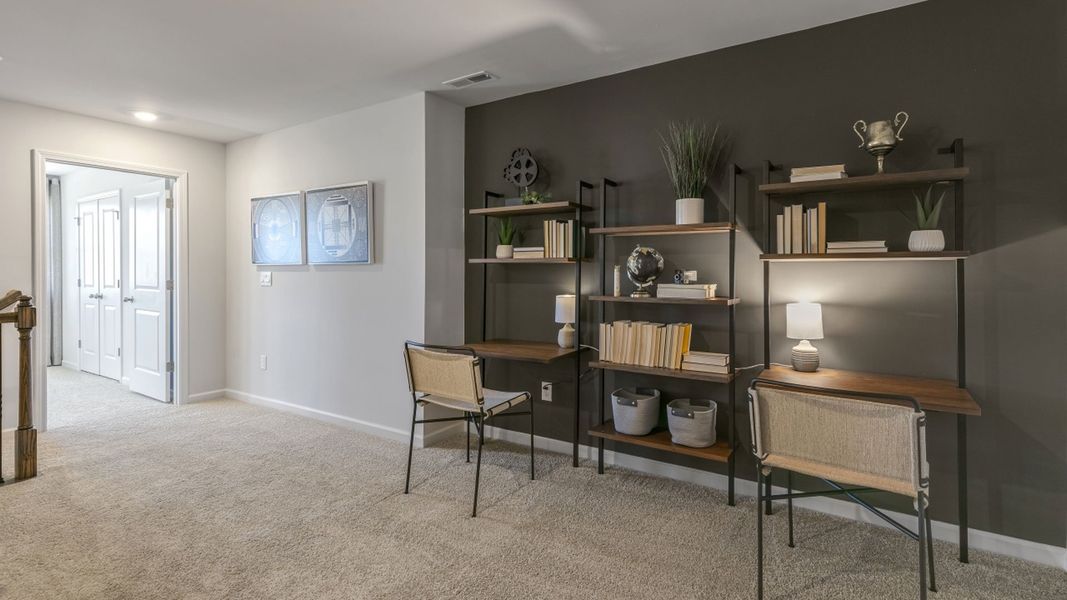 Furnished interior in a model home at The Meadows at Kinsley in Jamestown (Image 19).