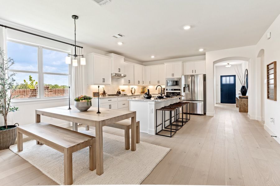 Furnished interior in a model home at Woodcreek in Fate (Image 5).