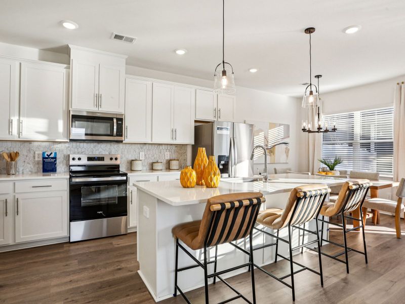 Furnished interior in a model home at Greystone - Vista Townhomes in Smyrna (Image 6).