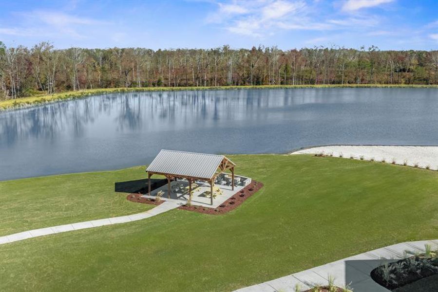 Enjoy getting your steps in with a stroll around the12-acre community lake Enjoy getting your steps in with a stroll around the12-acre community lake