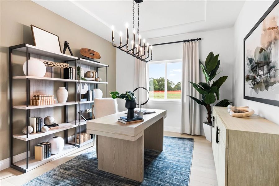 Furnished interior in a model home at The Reserve at Spiritas Ranch in Little Elm (Image 28).