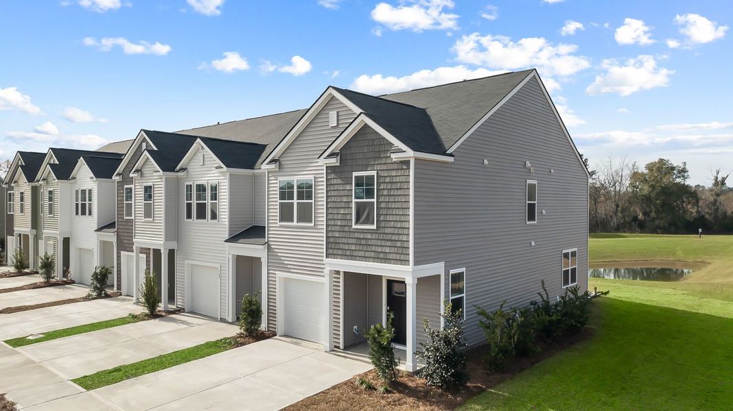 Front exterior of a home in the Carolina Groves Townhomes community, located in Moncks Corner, SC (Image 3).