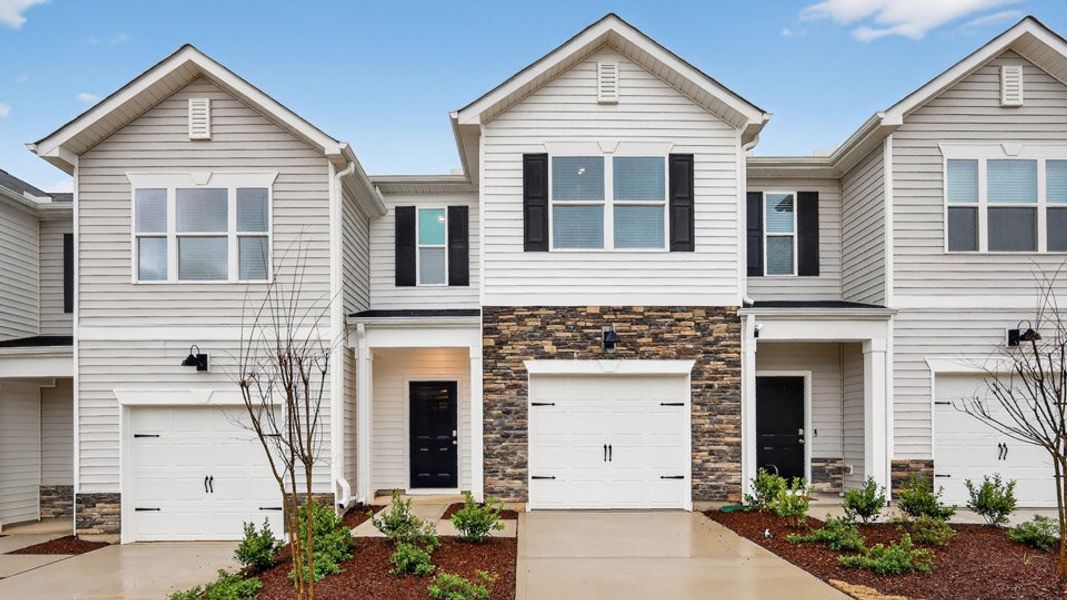 Front exterior of a home in the The Townes at Galvins Ridge community, located in Sanford, NC (Image 4).