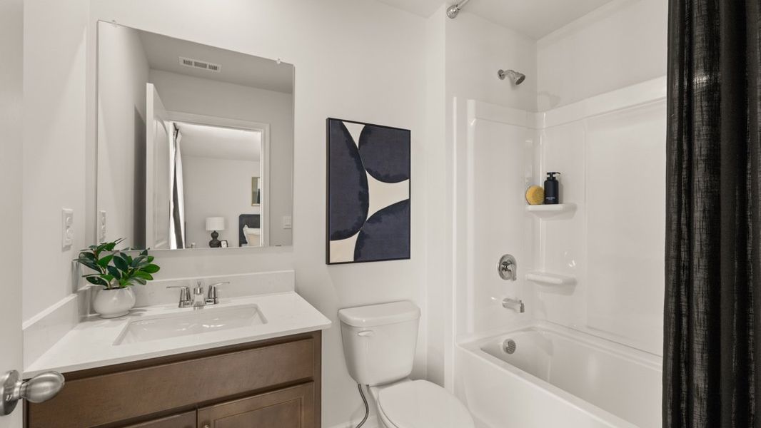 Furnished interior in a model home at Grandview at Lanier in Dawsonville (Image 25).