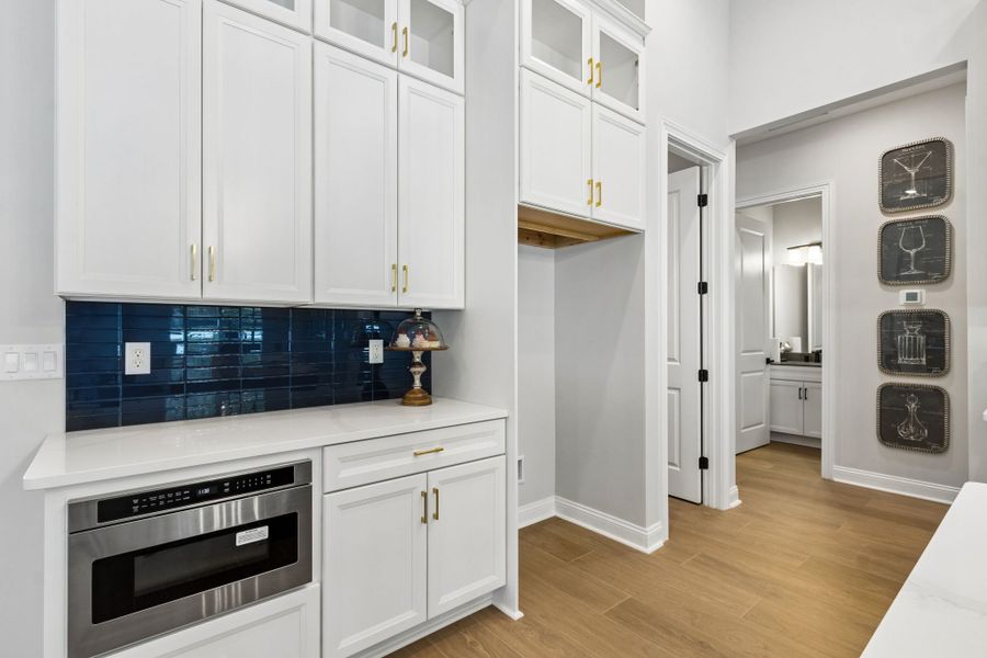 Furnished interior in a model home at Sandy Bluff in Yulee (Image 25).