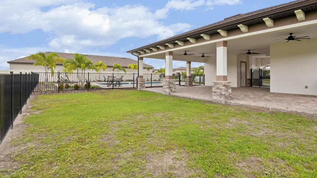 Spacious pavilion and open green lawn at Grasslands West—ideal for gatherings, events, or relaxing outdoors.