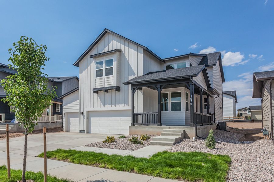 Front exterior of a home in the Trailside community, located in Timnath, CO (Image 17).