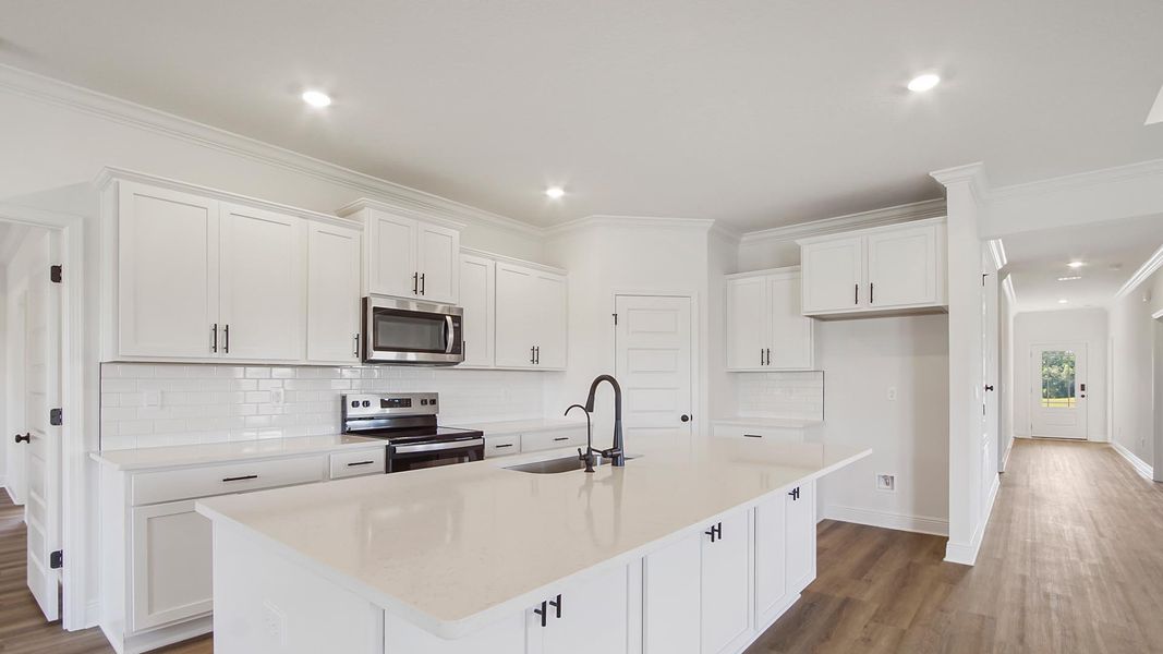 Furnished interior in a model home at Holley Grove at Peach Creek - Waterfront Homes in Santa Rosa Beach (Image 4).