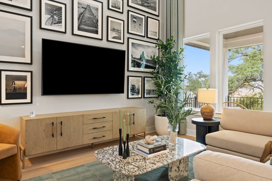 Furnished interior in a model home at Wolf Ranch in Georgetown (Image 7).