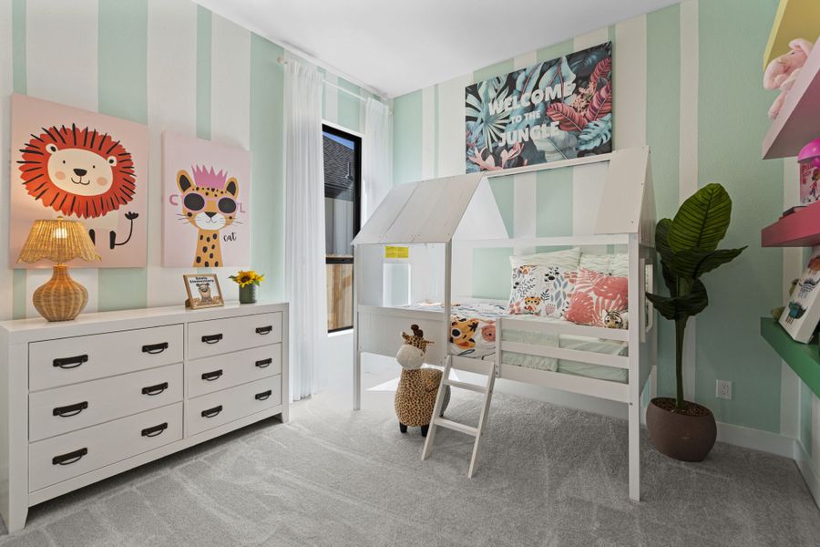 Furnished interior in a model home at Hunters Crossing in Sealy (Image 20).