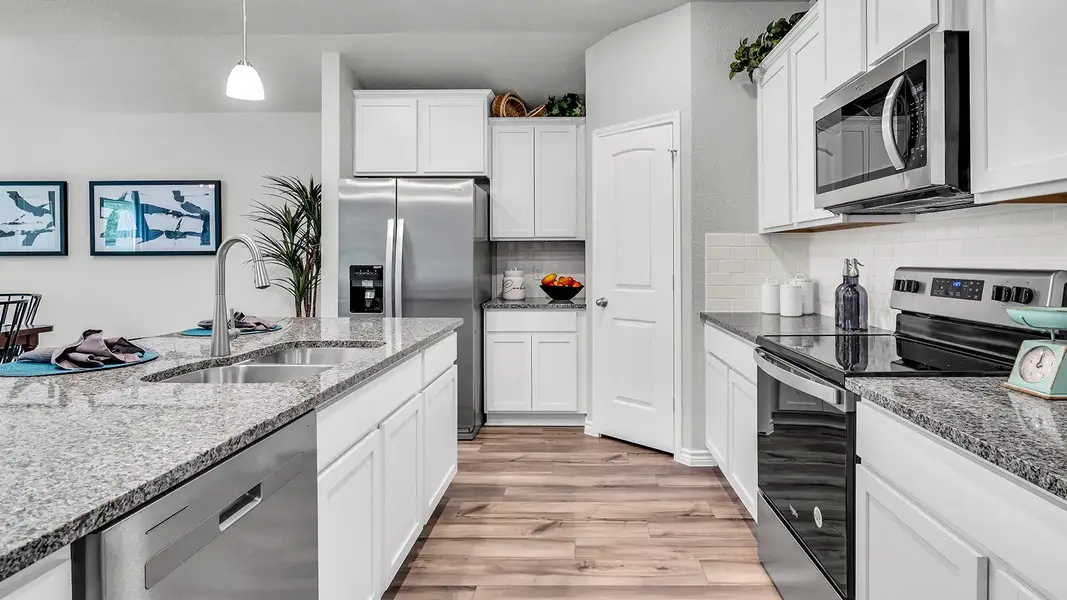 Furnished interior in a model home at Three Creeks - Colt Creek in Belton (Image 5).