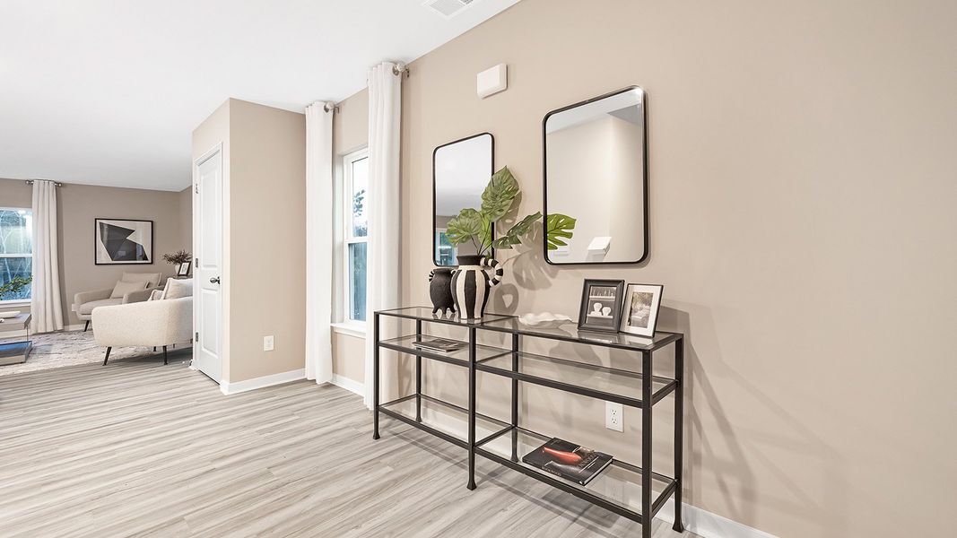 Furnished interior in a model home at Woodhaven at Chester in Chester (Image 3). Furnished interior in a model home at Woodhaven at Chester in Chester (Image 3).