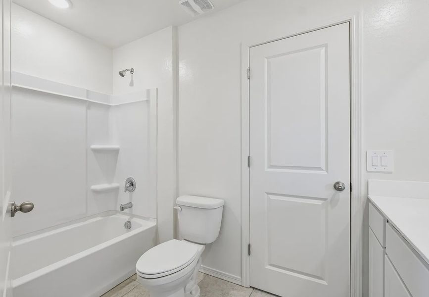 Furnished interior in a model home at Wales Ranch in San Tan Valley (Image 21).