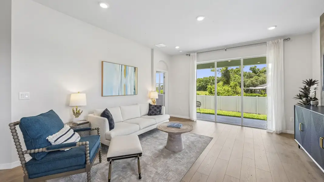 Furnished interior in a model home at Gladstone Park Villas in Sarasota (Image 12).