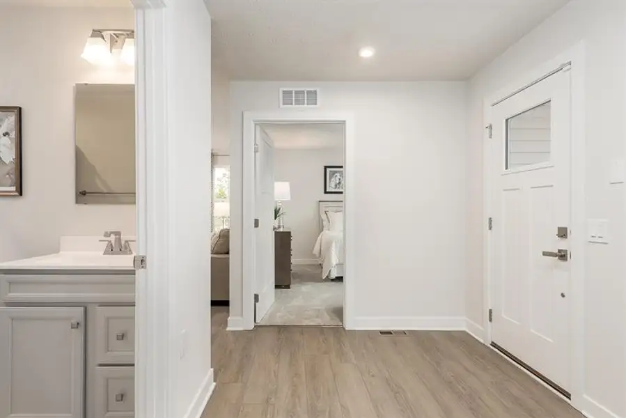 A wide, open foyer creates simple, graceful movement throughout your one-level home. A wide, open foyer creates simple, graceful movement throughout your one-level home.
