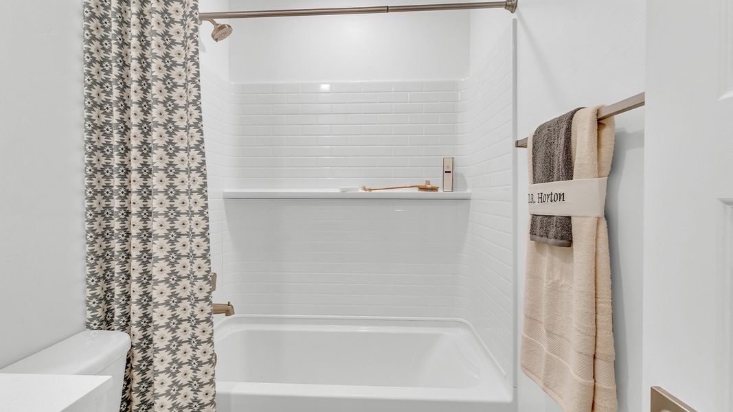 Furnished interior in a model home at Coronet at Gladden Farms in Marana (Image 87).