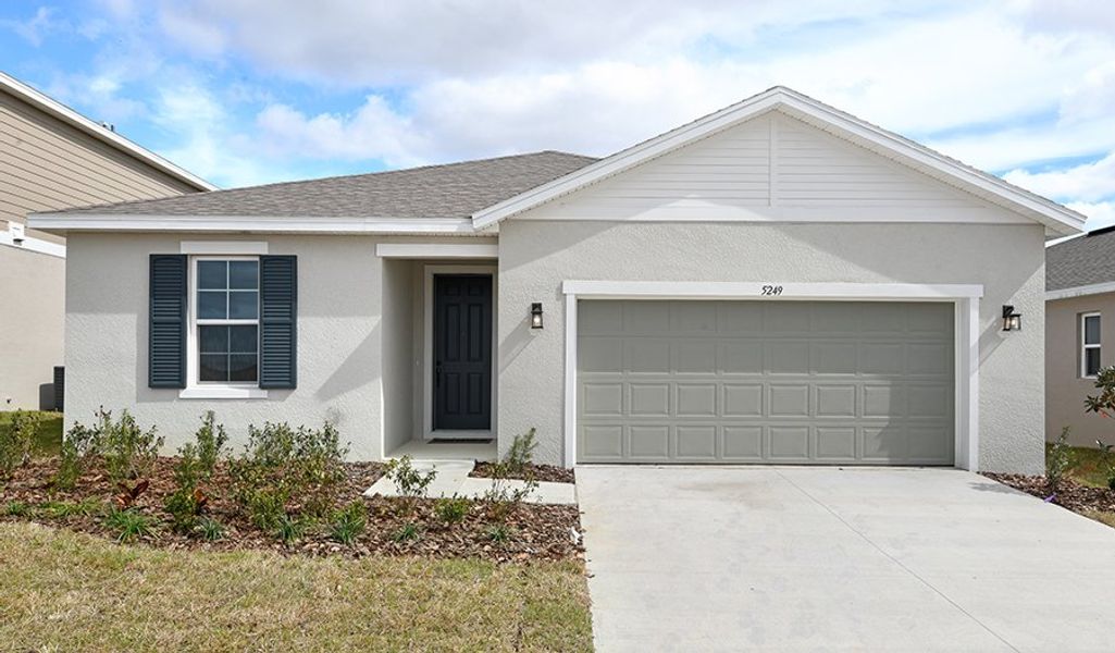 Front exterior of a home in the Seasons at Aurora Oaks community, located in Ocala, FL (Image 3).