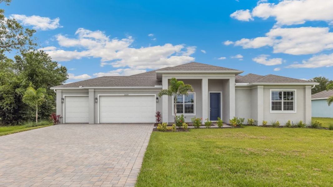 Front exterior of a home in the Deep Creek Tradition Series community, located in Punta Gorda, FL (Image 2).