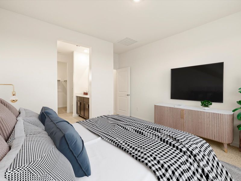 Furnished interior in a model home at Entrada Estate Series in Tolleson (Image 10).