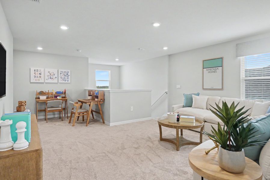 Furnished interior in a model home at Malabar Springs Signature in Palm Bay (Image 5).
