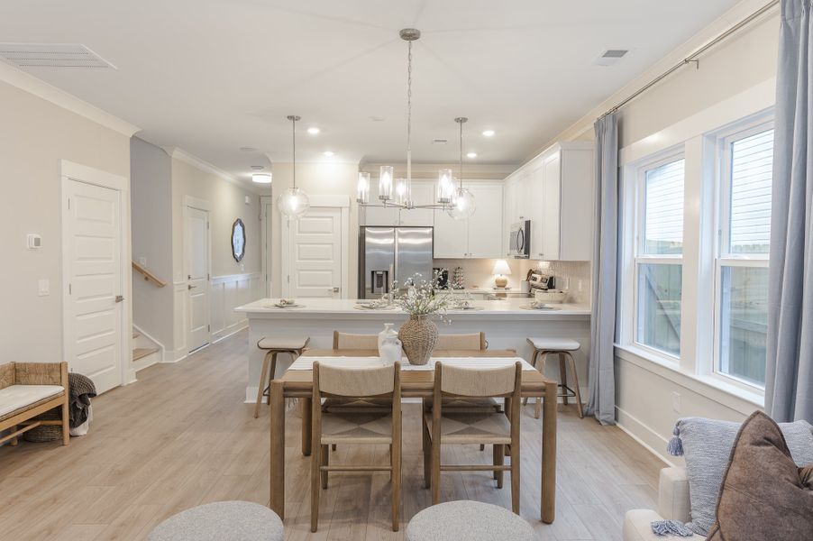 Furnished interior in a model home at Founder's Park in Summerville (Image 7).