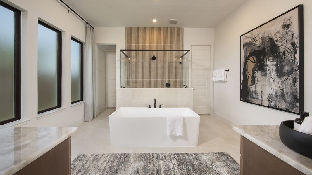 Furnished interior in a model home at Riceland 70' in Mont Belvieu (Image 14).