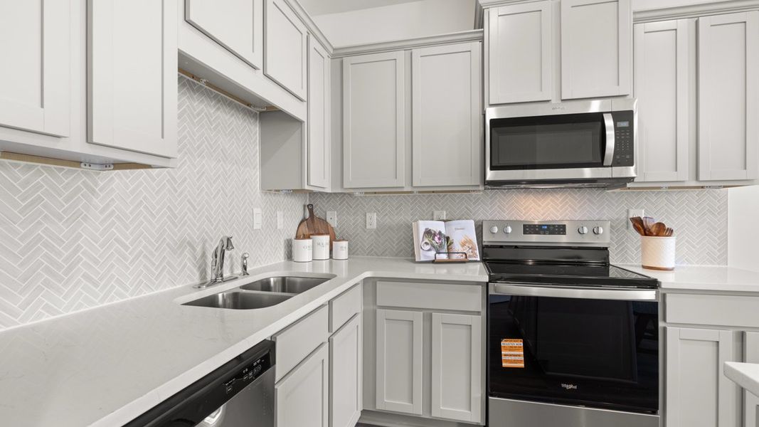 Furnished interior in a model home at The Gables at Agricultural Village in Perry (Image 10).