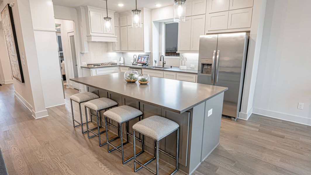 Furnished interior in a model home at Las Lomas in Forney (Image 7).