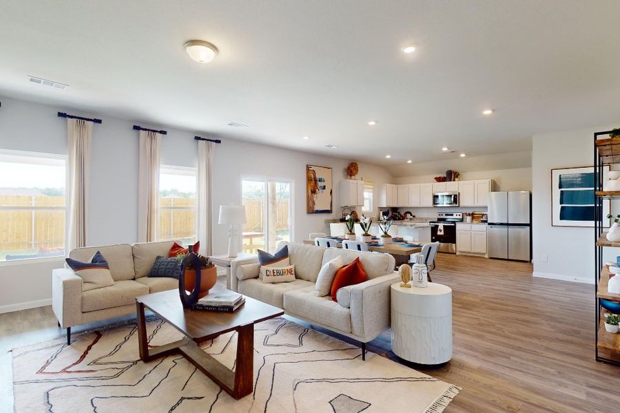 A living room with a large window.